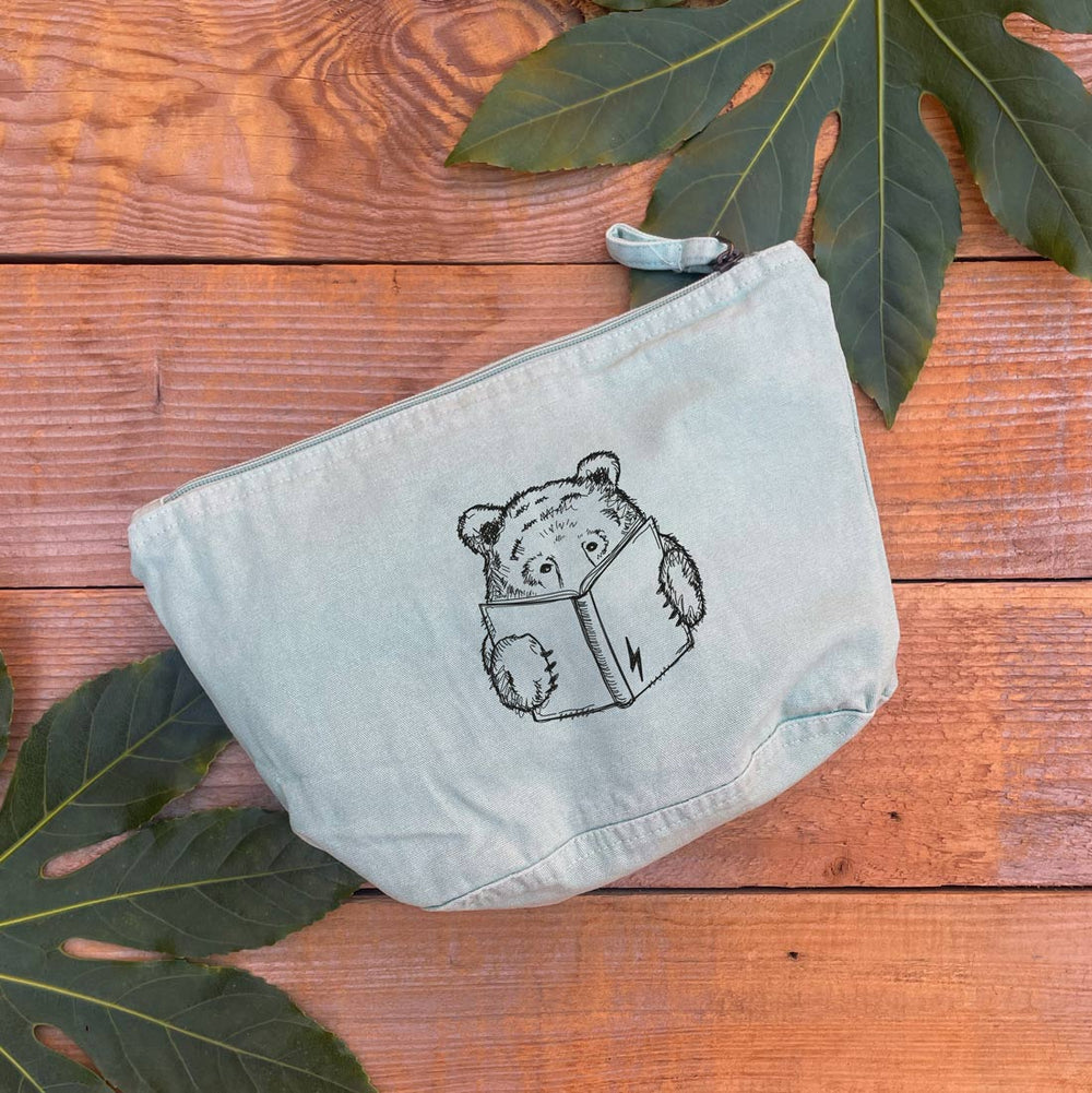 mint colour bag with bear print