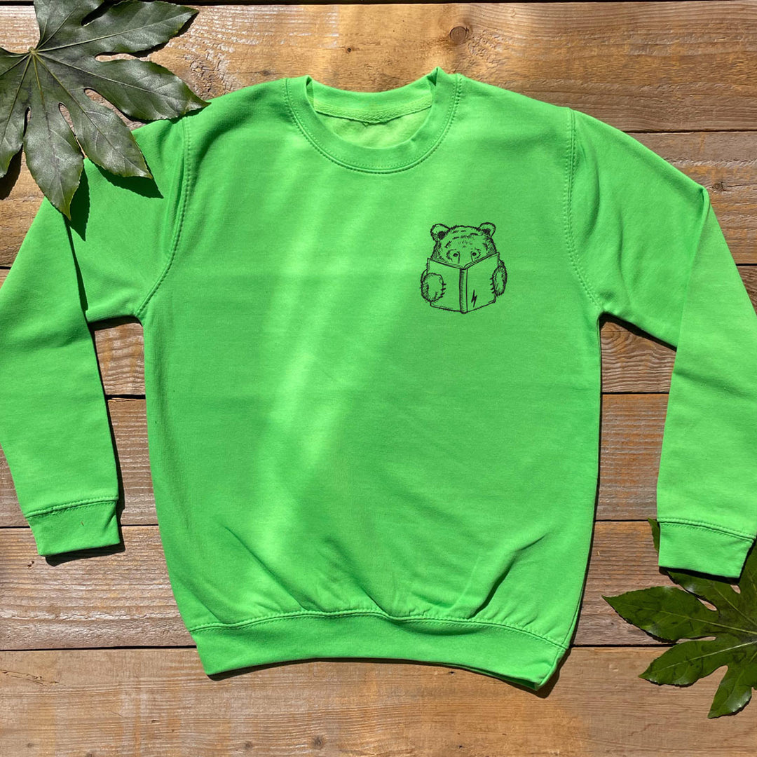 green kids jumper  with bear reading a book design