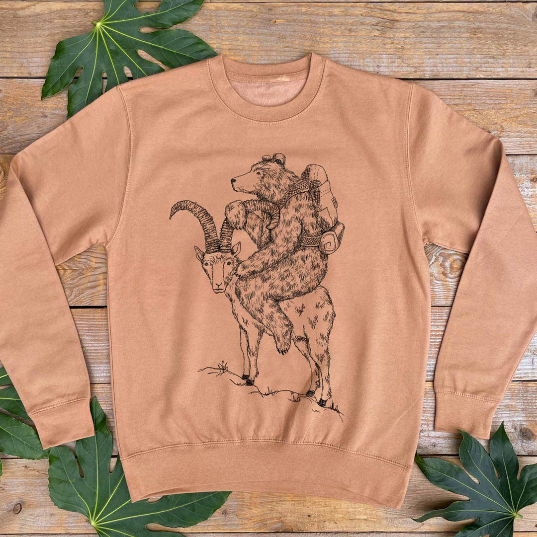 brown sweater with bear riding goat print