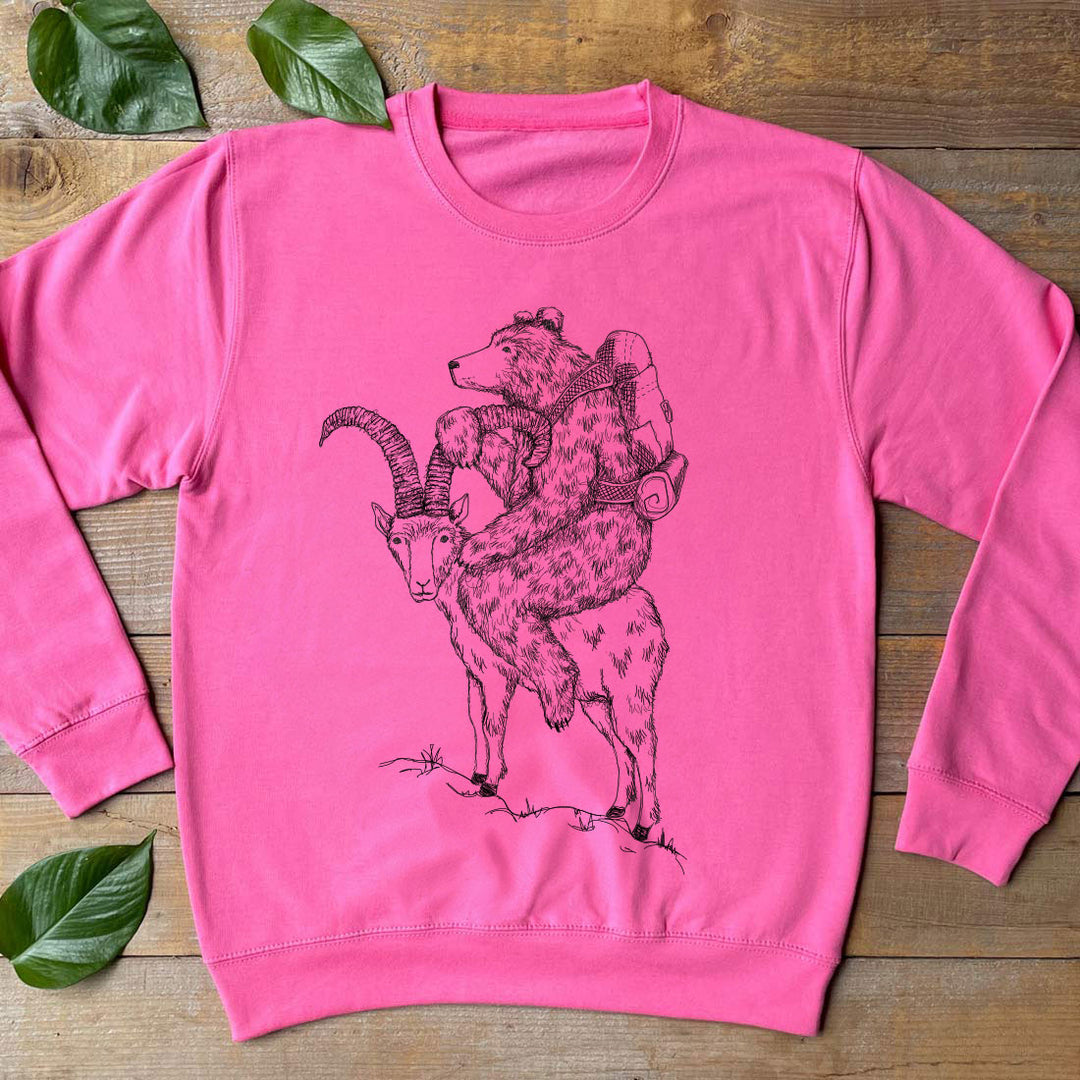 pink jumper with bear and mountain goat print