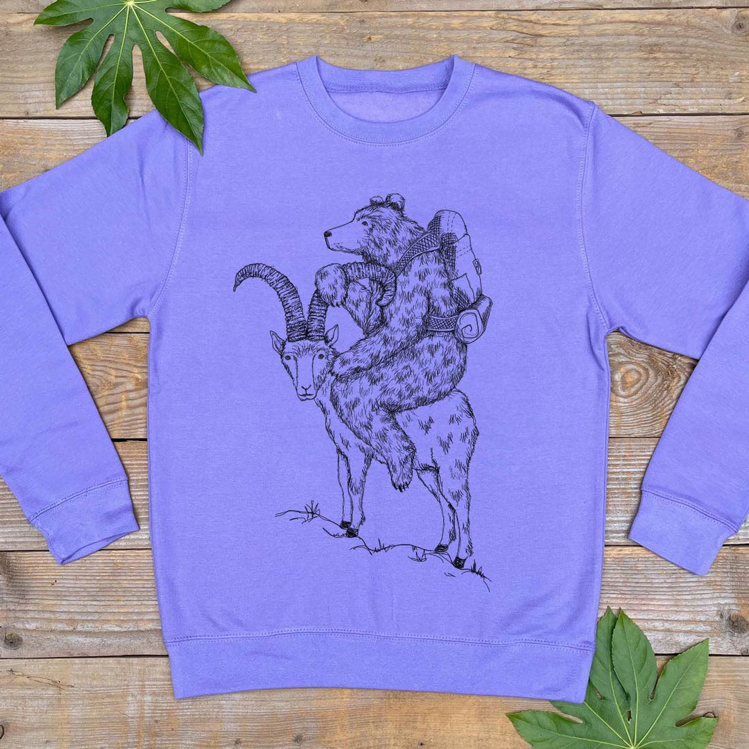 purple jumper with a bear riding a goat print