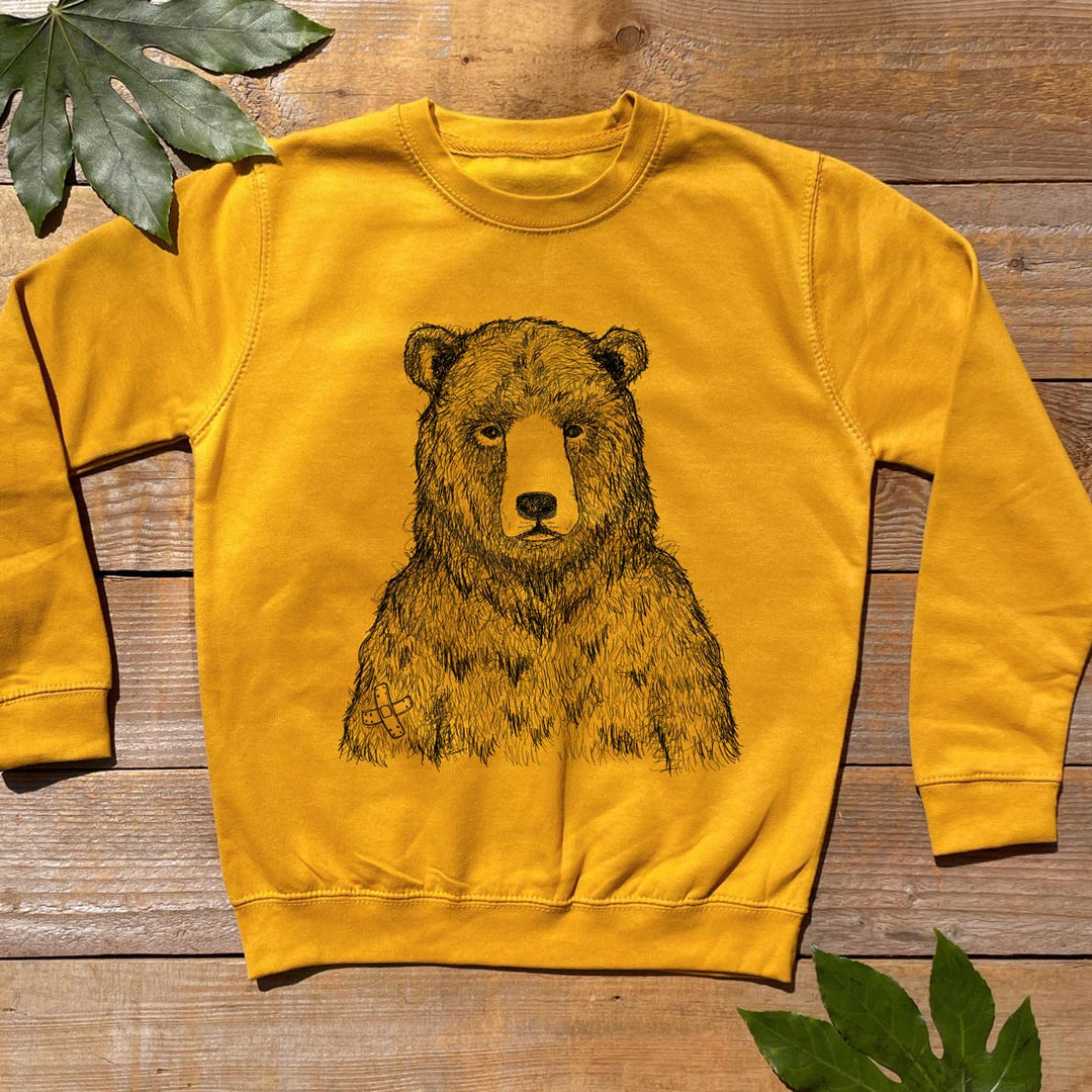 mustard jumper with bear design
