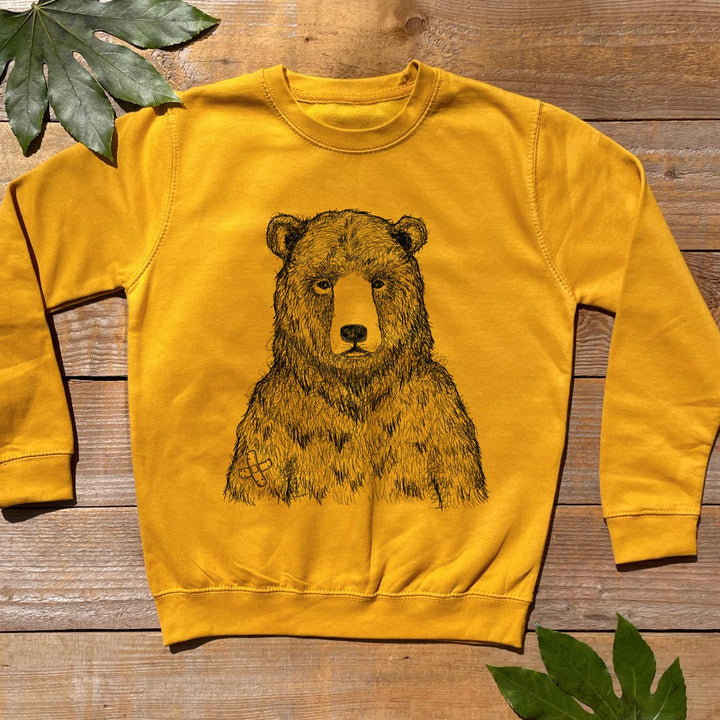 mustard jumper with bear design
