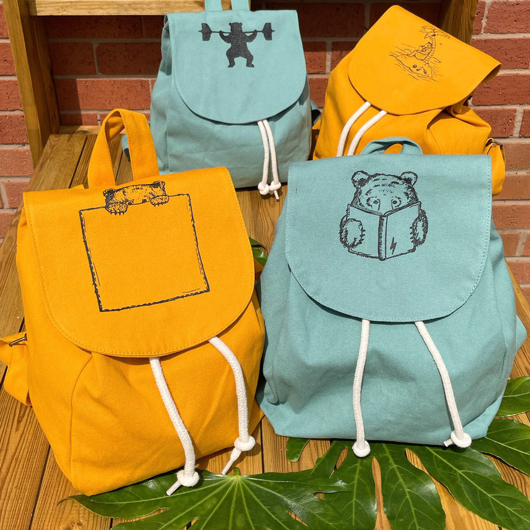 small bear backpacks together in group shot