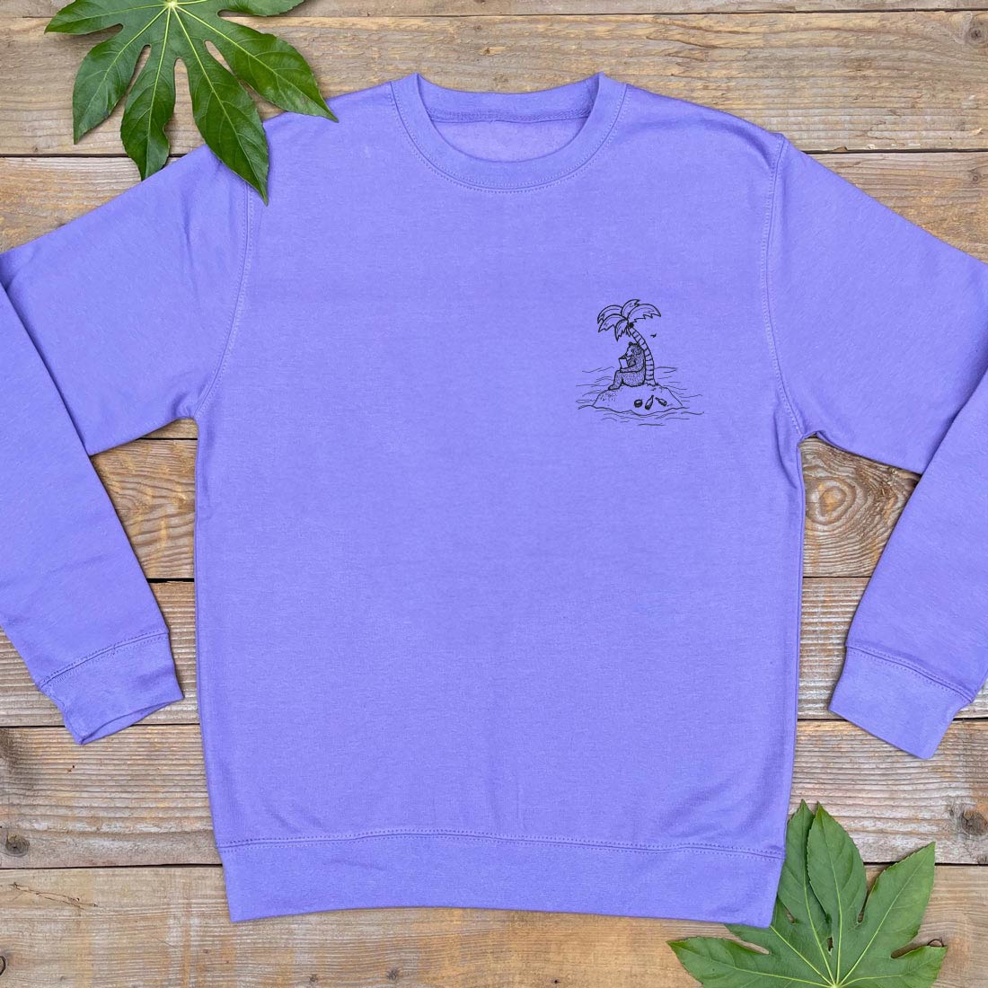 BEAR SAT ON ISLAND WIT PALM TREE PURPLE JUMPER