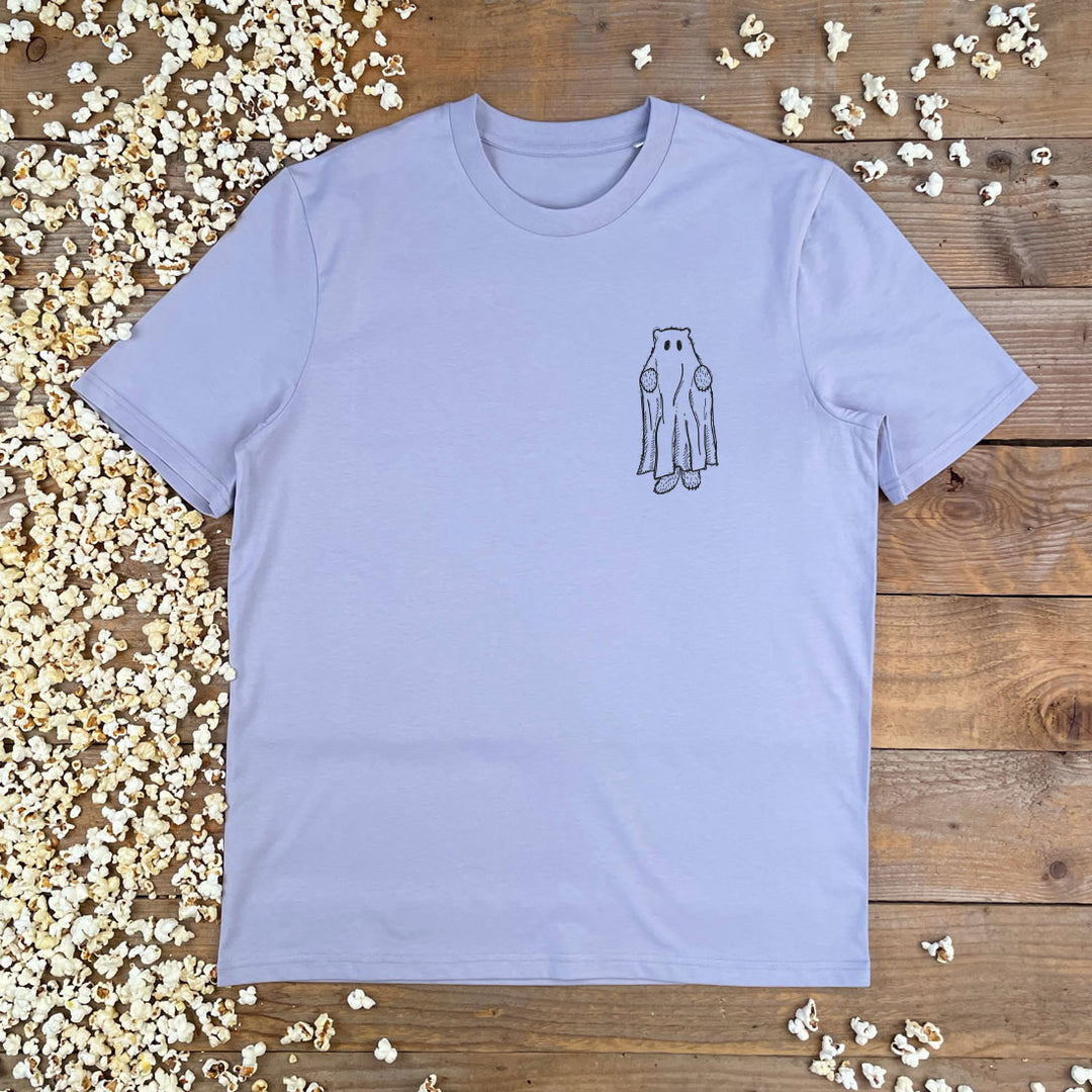 Light blue t-shirt with a ghost design on a wooden surface with popcorn.