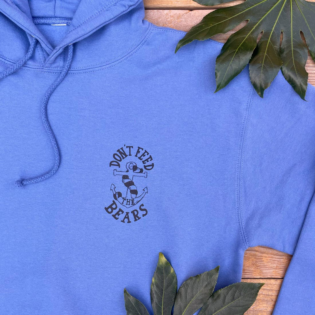 blue hoodie with close of anchor design