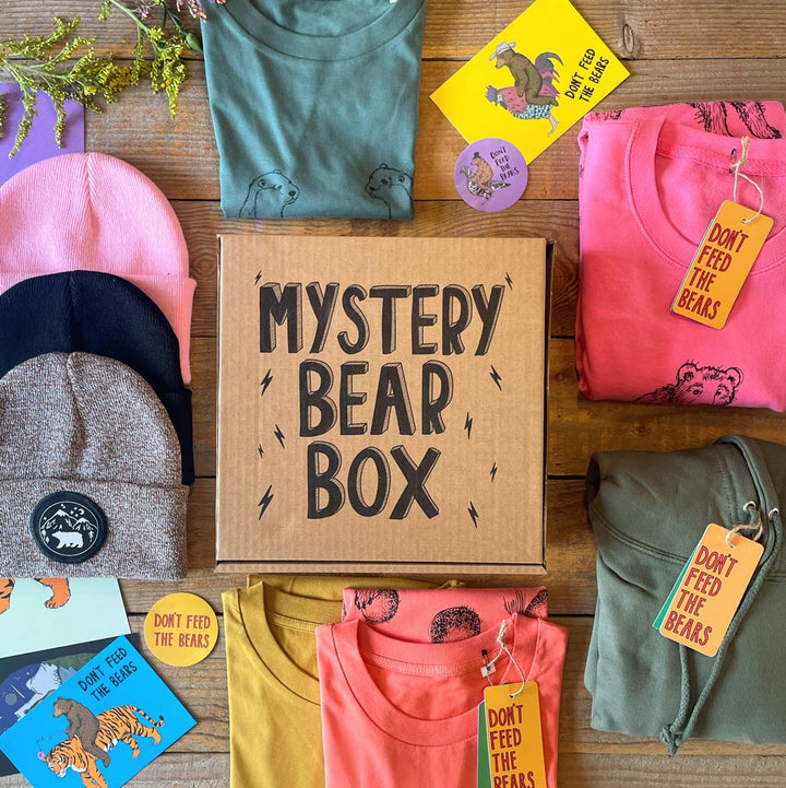 mystery bear box with hats, jumpers and tshirts