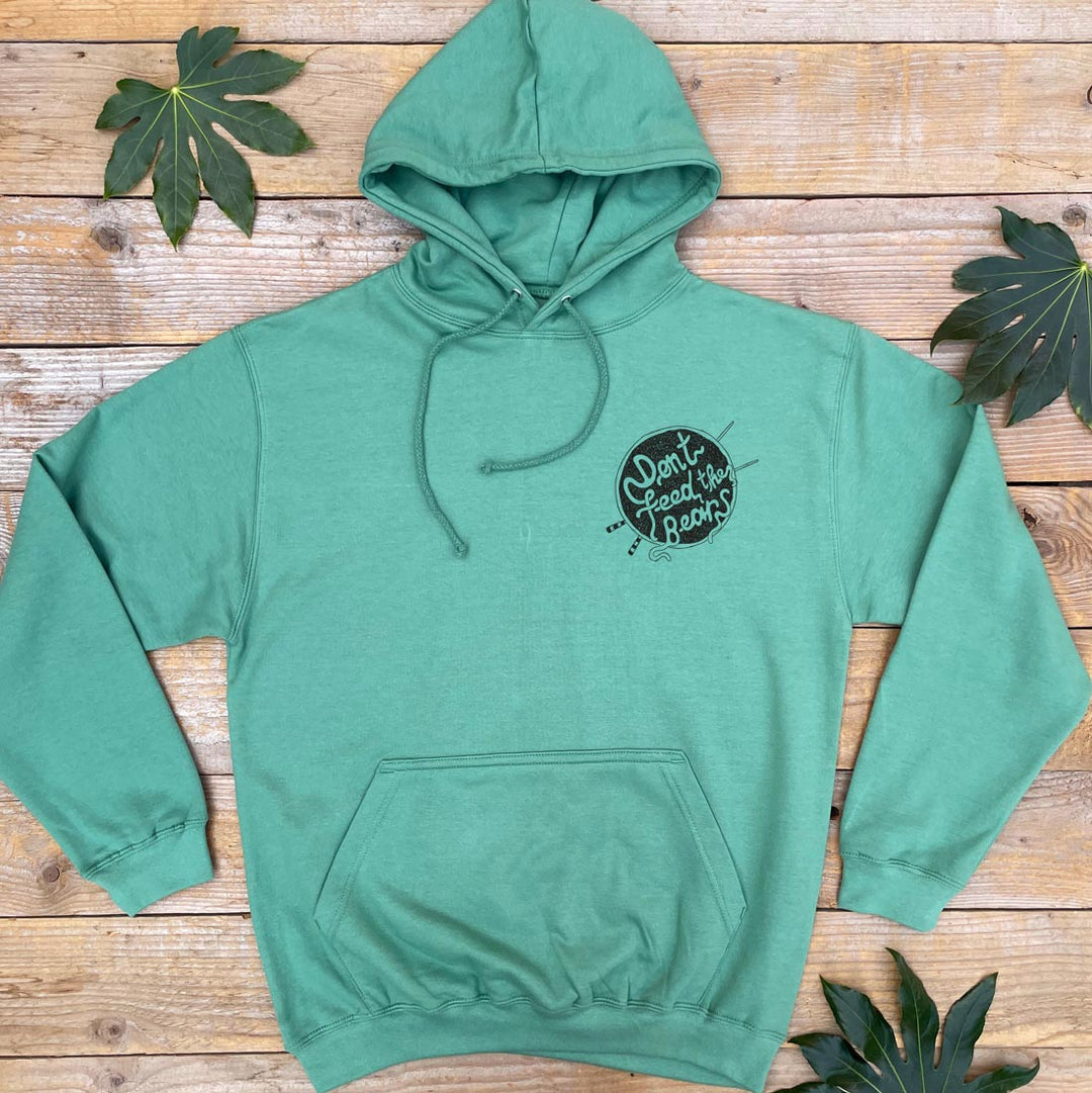 green hoodie with bear logo