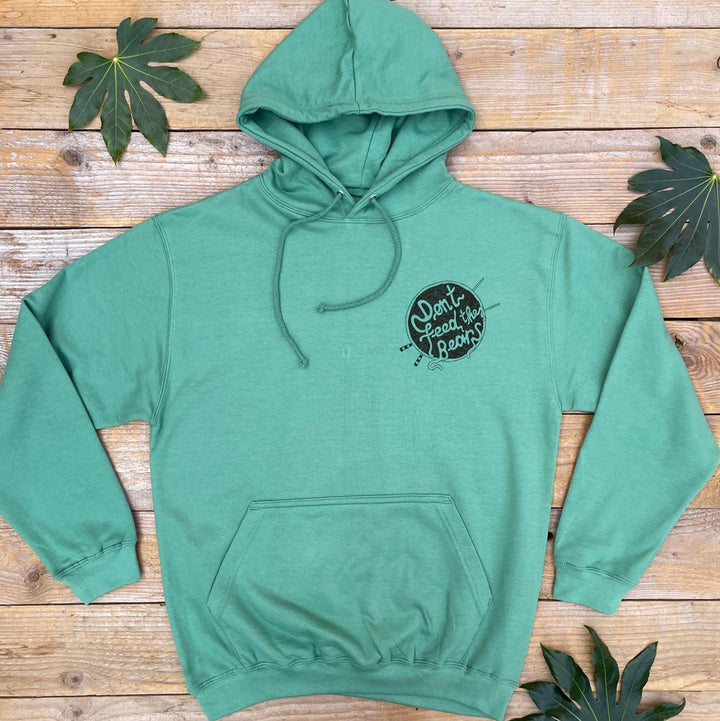 green hoodie with bear logo