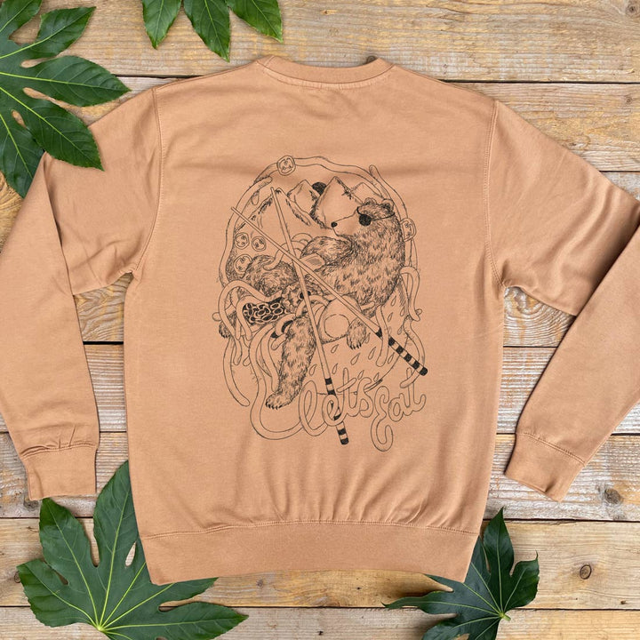 brown jumper with bear and noodles print