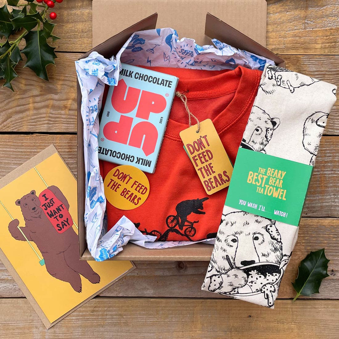 INSIDE BEAR BOX, JUMPER, TEA TOWEL AND CHOCOLATE