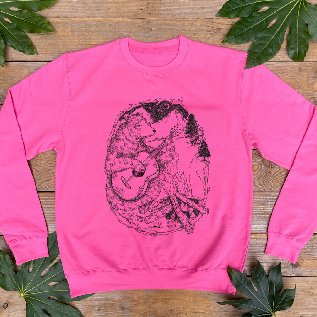 pink jumper with bear and campfire