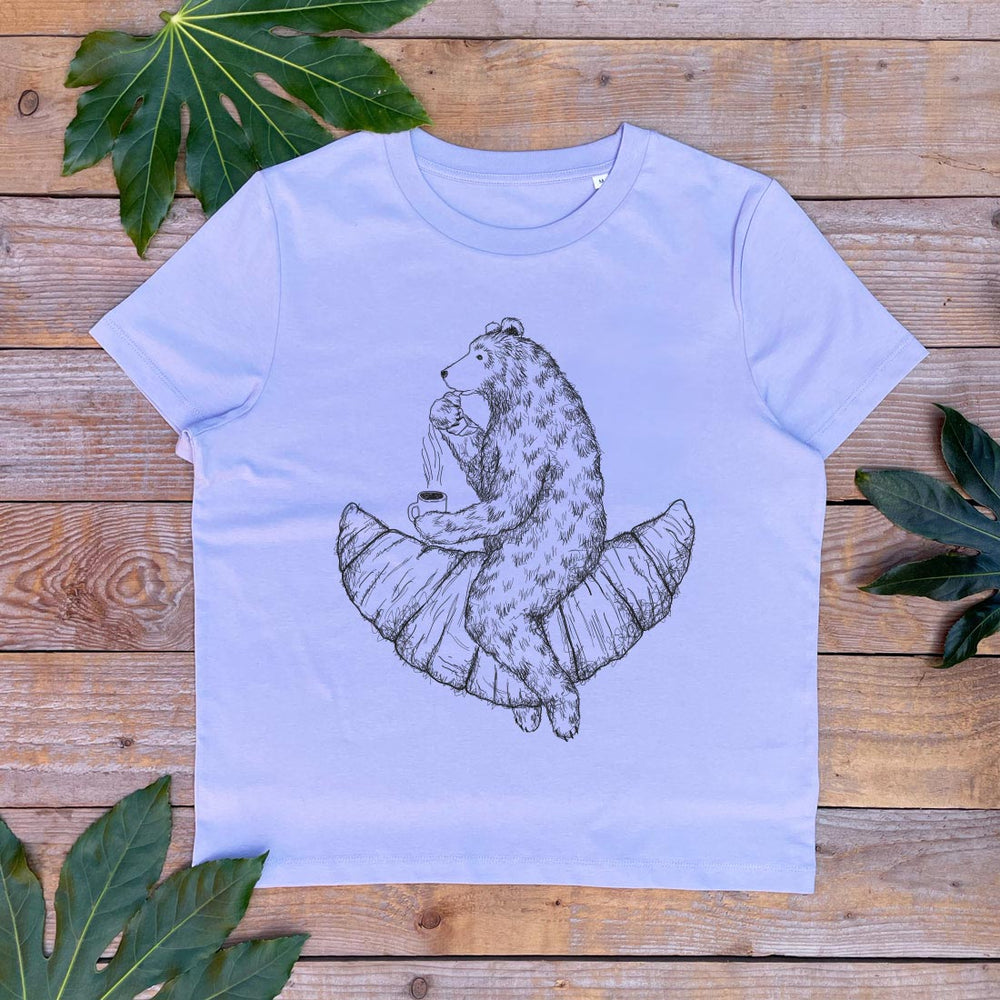 purple tshirt with bear riding a croissant