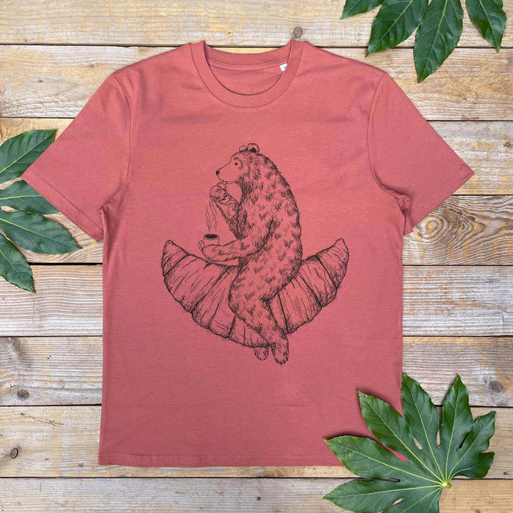 bear eating croissant design on a brown tshirt
