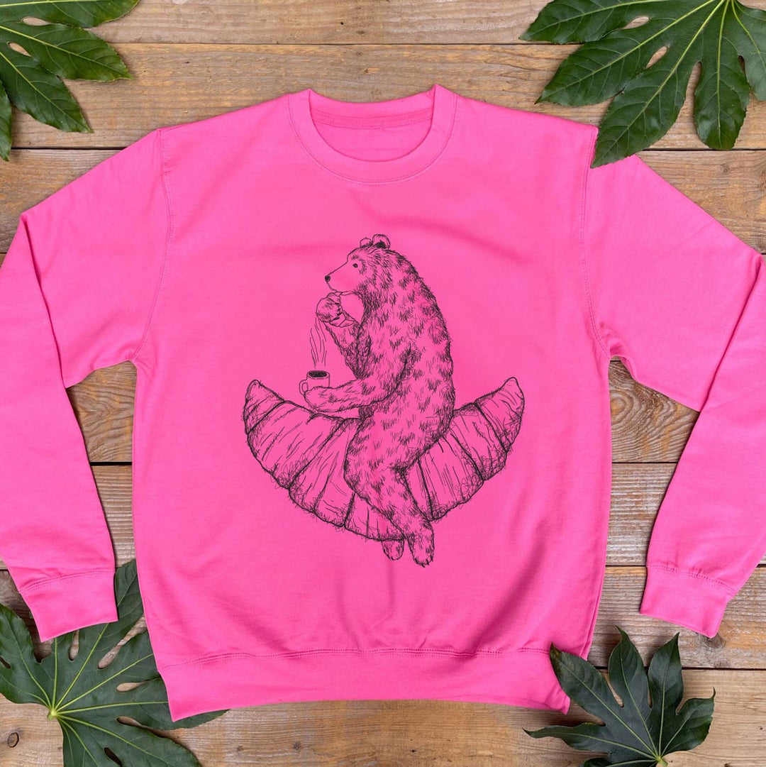 pink sweater with bear and croissnat design