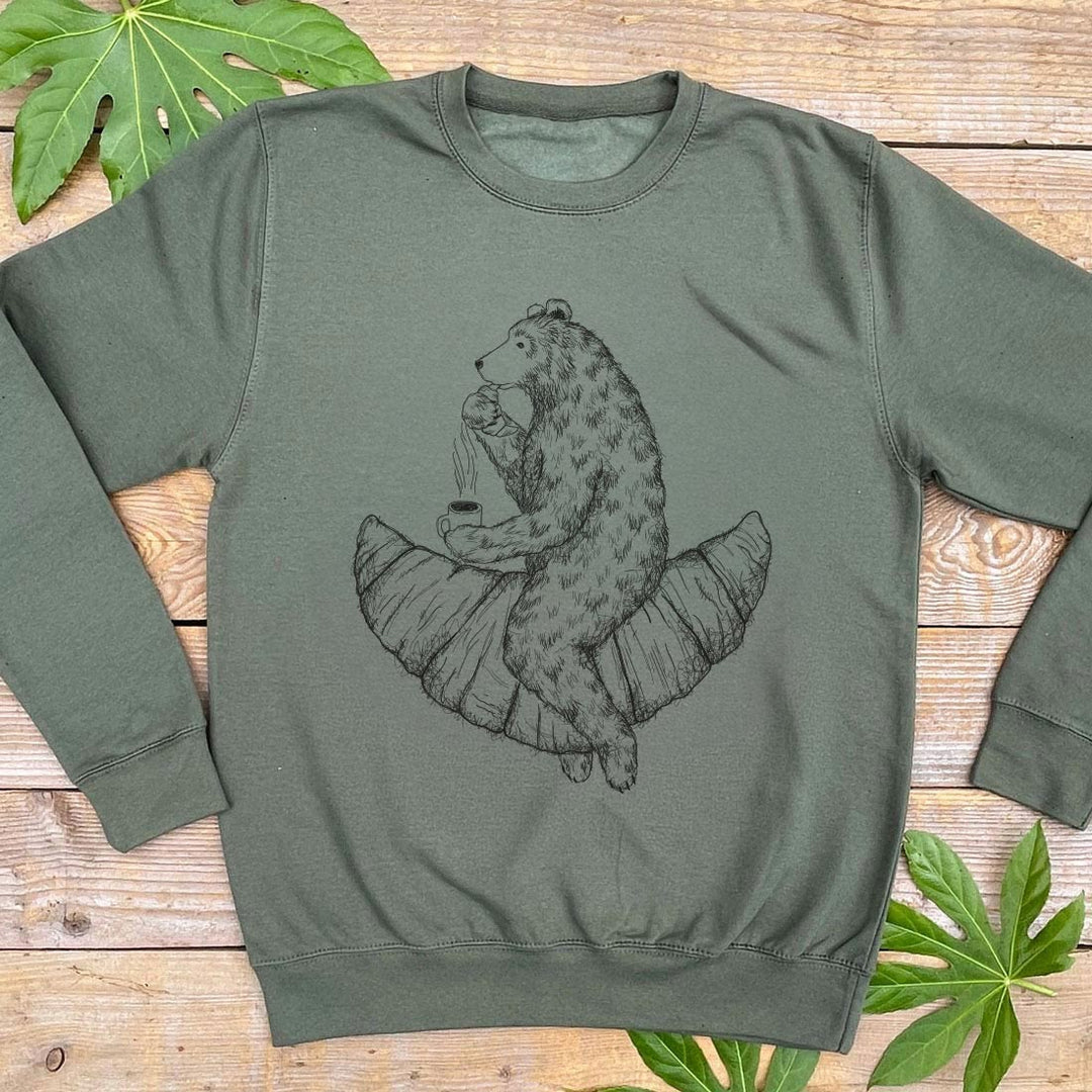 bear riding a croissant jumper