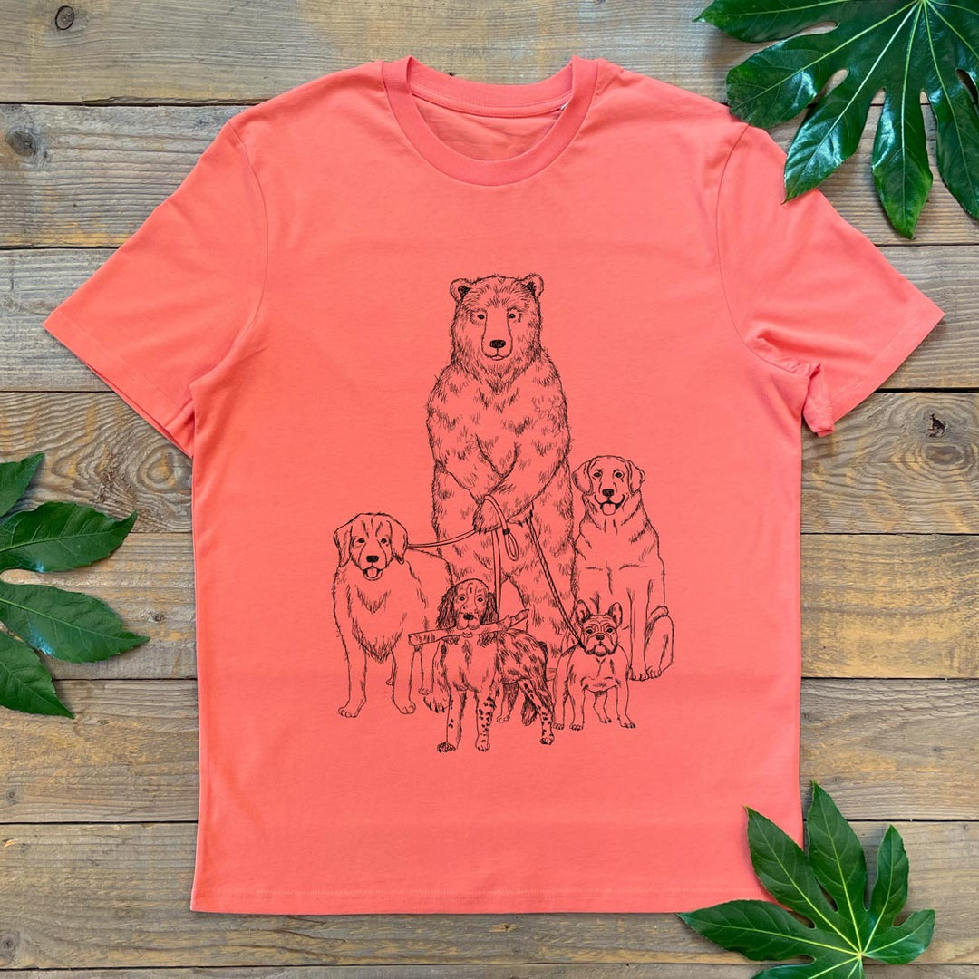 reddish tee with print of bear walking lots of dogs