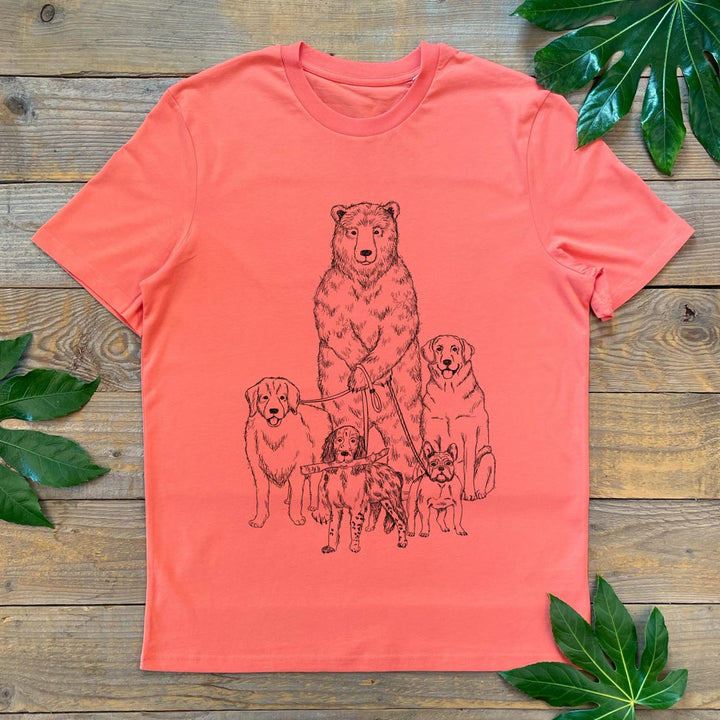 reddish tee with print of bear walking lots of dogs