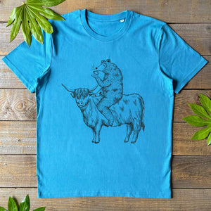 BEAR RIDING HIGHLAND COW BLUE TEE