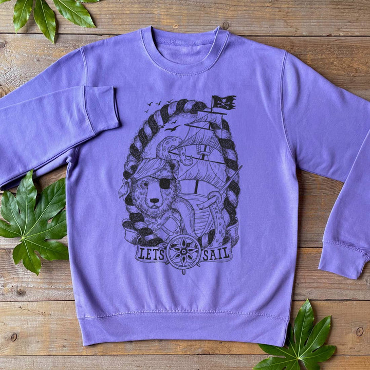 purple jumper with pirate bear design