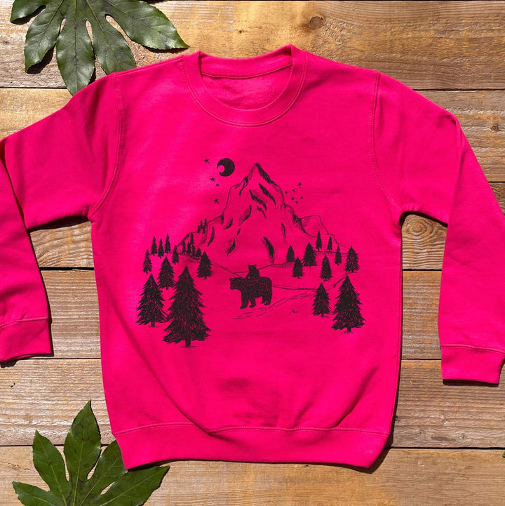 pink kids jumper with bear and mountain print