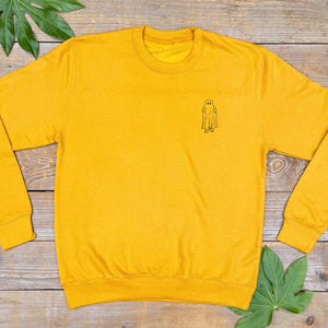 mustard jumper with ghost bear pocket print