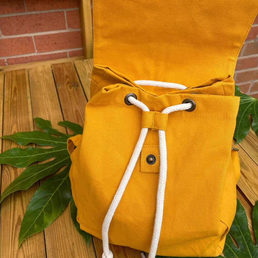 draw string mustard backpack