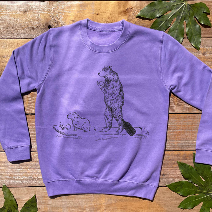 purple jumper wuth bear on paddle board print