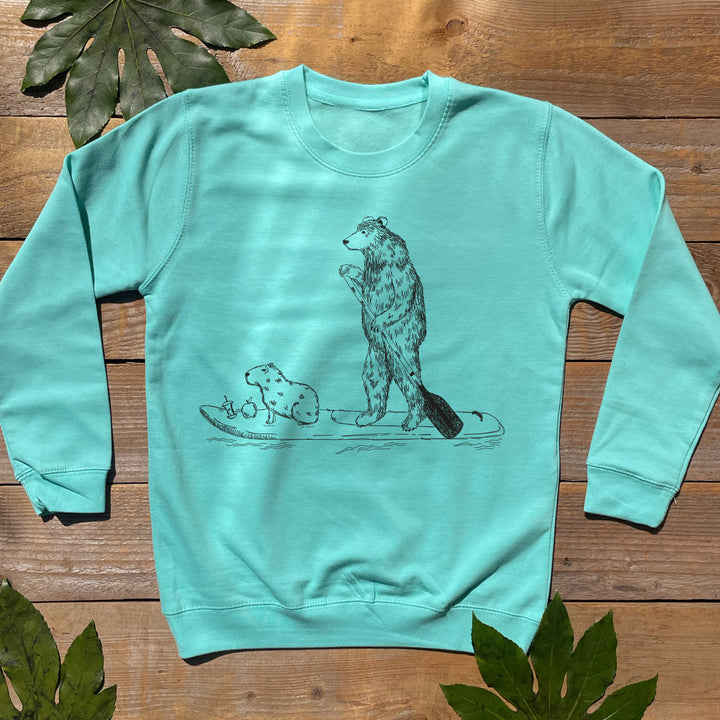 kids blue jumper with bear and paddel board design