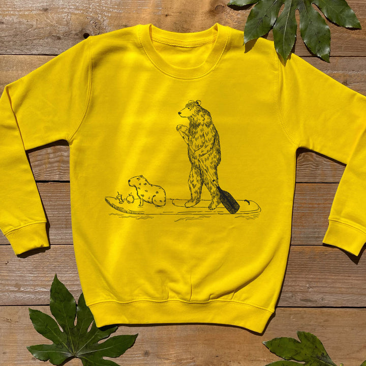 yellow jumper with paddle boarding bear print
