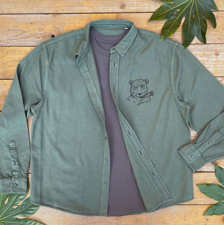 pesto green shirt with pocket print of a bear eating sushi