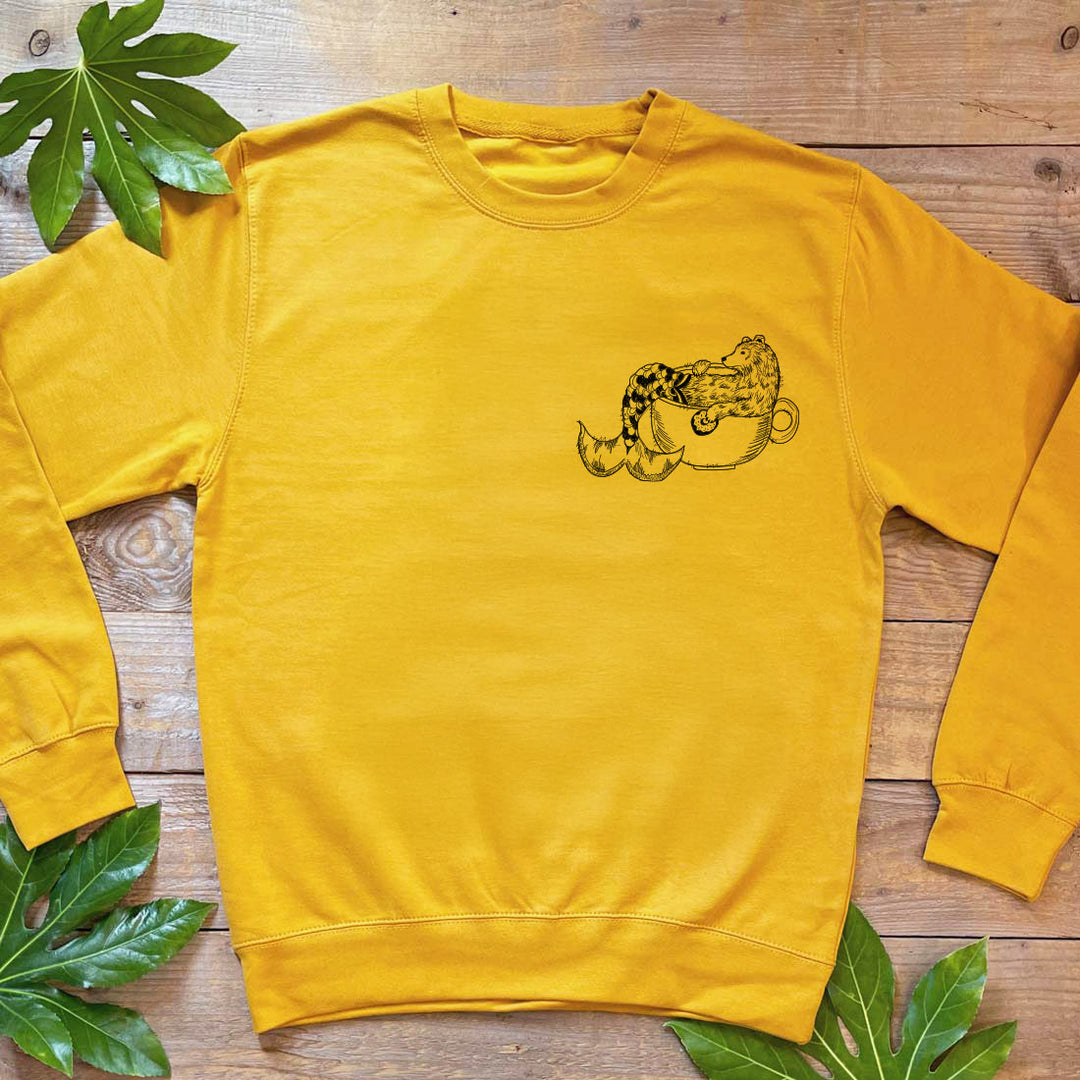 mustard colour jumper with merbear design
