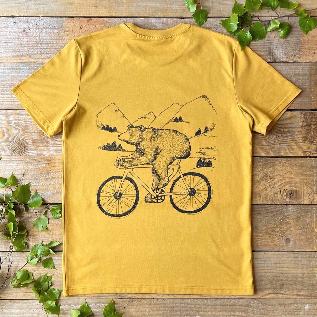 mens mustard t-shirt with bear riding a bike